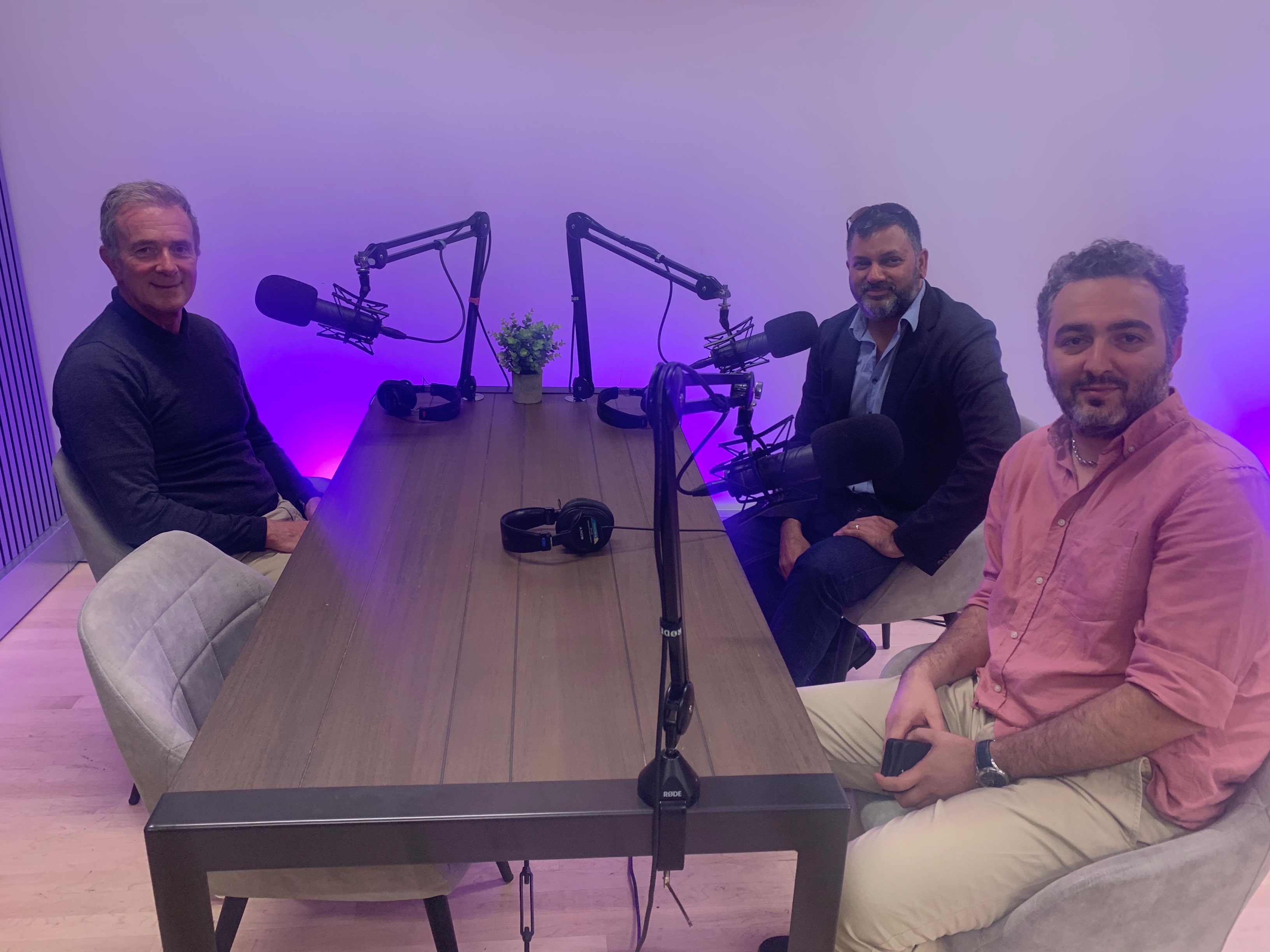 Leon Lobo and Ali Ashkhasi discussing time-as-a-service with Nick Layzell in podcast studio