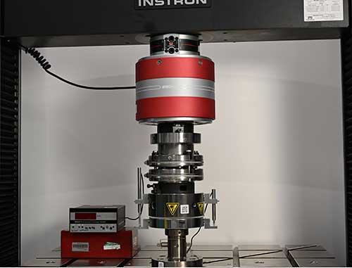 Compression setup for measurement of textile compressibility