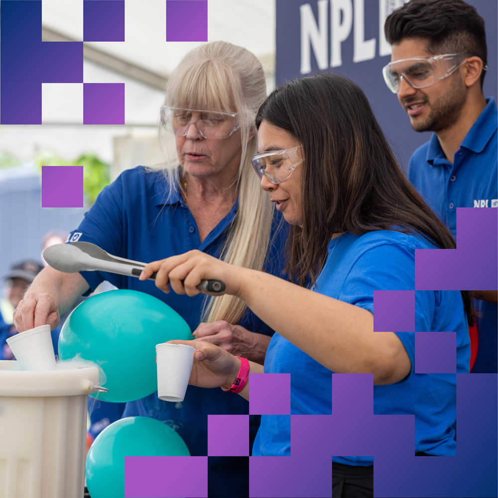 Employees conducting liquid nitrogen show