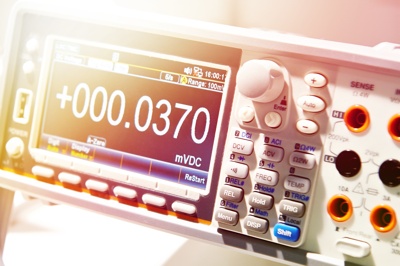 Digital instrument displaying precise electrical readings used to ensure measurement consistency